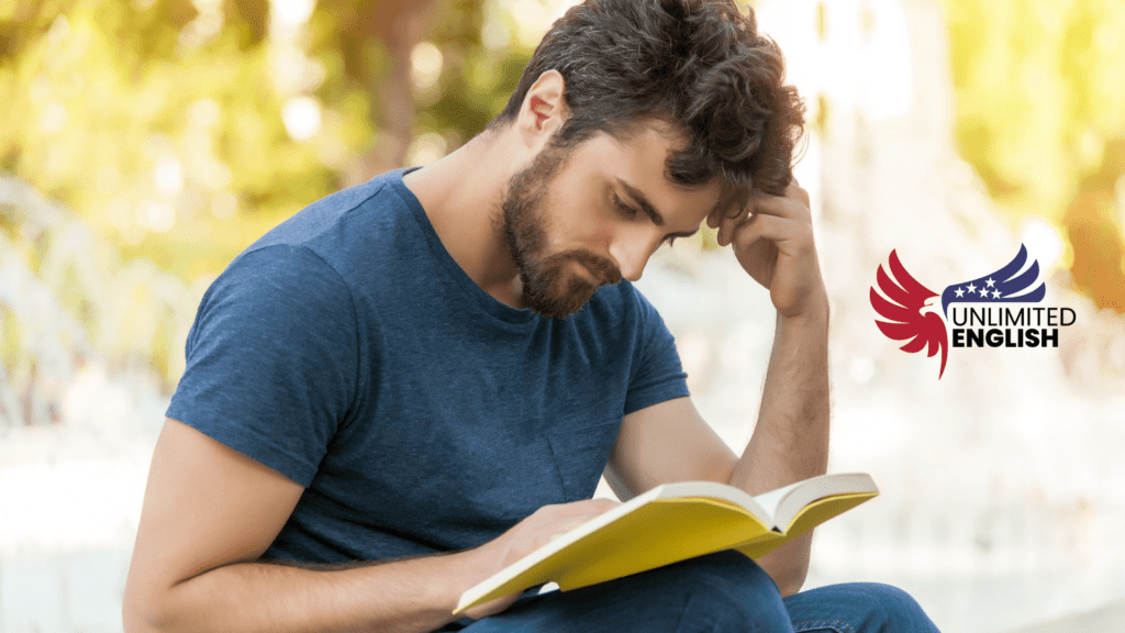 
A man reading a book to improve his vocabulary

